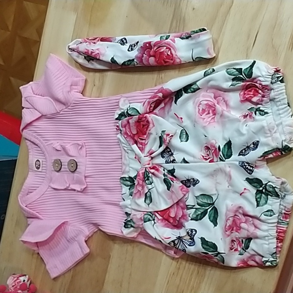 70 Clothing. Sold as a set. Adorable Onesie with the cutest floral print shorts.